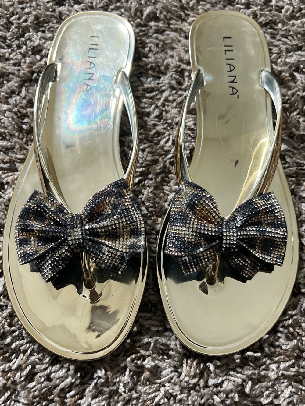 Liliana Gold Thong Sandals with Leopard Rhinestone Bow